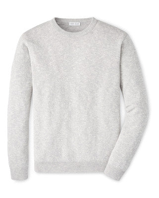 The Peter Millar Montauk Crewneck Sweater is a lightweight, long-sleeve sweater in plain light gray, shown laid flat on a white background. It offers stylish comfort, ideal for everyday wear.