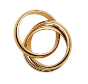 Two interlocking gold rings, including the Lie Studio Sofie Ring, are displayed against a white background to create a striking statement look.