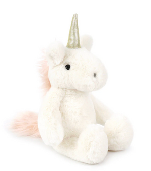 Shyla Unicorn - Cream by Mon Ami is a premium plush toy featuring a shiny holographic horn, black eyes, and a fluffy light pink tail. This plush white unicorn sits upright against a plain white background.