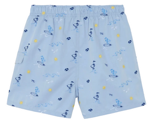 Discover the Boys’ Printed Swim Short by Tartine et Chocolat—light blue swim shorts featuring an elastic waistband and a fun print of ducks on surfboards, suns, and waves in blue and yellow. Perfect for adventurous young explorers ready to make a splash on their next beach trip!.