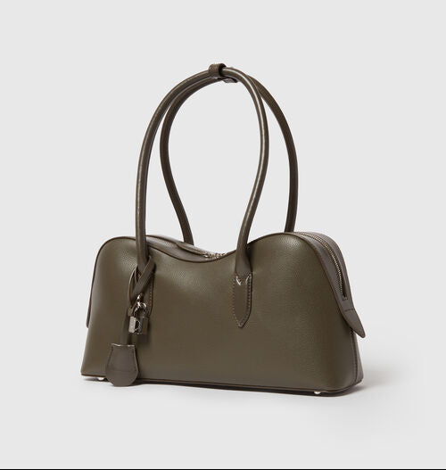The Ryder Shoulder Bag by Stella McCartney is a structured olive green vegan bag with double handles, silver hardware, and a lock-and-key accent, shown against a plain light background.