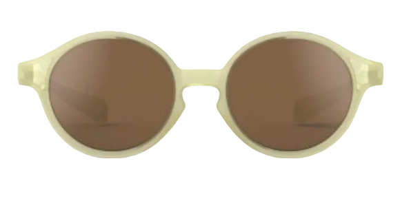 IZIPIZI Baby #D Polarized Sunglasses featuring round, light beige frames and brown polarized lenses, designed as lightweight toddler sunglasses with UV protection, are displayed on a white background.
