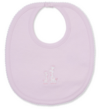 The Giraffe Laughs Bib by Kissy Kissy is crafted from soft Pima cotton in light pink, featuring an embroidered giraffe and calf design at the center, scalloped trim, and a secure snap closure at the neck.
