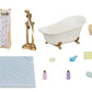 The Calico Critters Bath & Shower Set features a miniature bathtub, shower, curtain, bath mat, basket, towel rack, shampoo bottles, soap, toy fish, towel, and sponge—this charming furniture set includes delightful bath time accessories from Calico Critters and is artfully arranged on a white background.