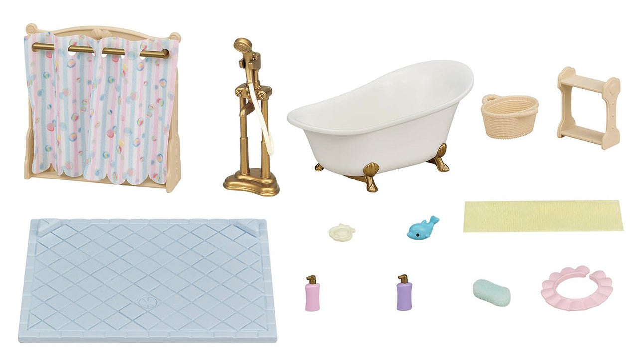The Calico Critters Bath & Shower Set features a miniature bathtub, shower, curtain, bath mat, basket, towel rack, shampoo bottles, soap, toy fish, towel, and sponge—this charming furniture set includes delightful bath time accessories from Calico Critters and is artfully arranged on a white background.