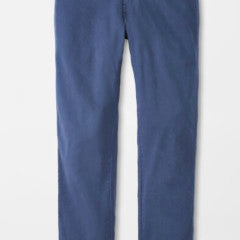 The Peter Millar Signature Sateen Five-Pocket Pant, shown in blue with a slim fit and superior stretch, features classic five-pocket styling and is laid flat on a white background.