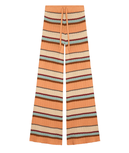 The Guest in Residence Palazzo Pant features a drawstring waist and breathable wide-leg design with horizontal zigzag stripes in orange, beige, blue, and burgundy.