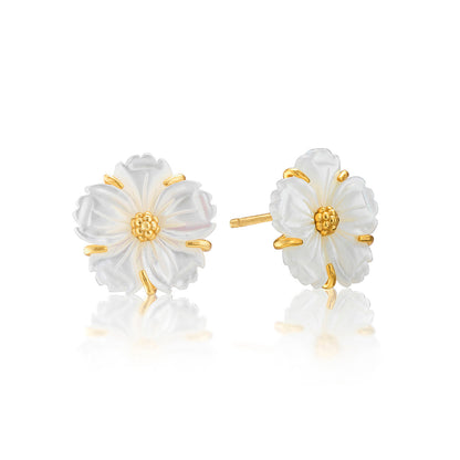 The Juliska Capucine De Wulf Mermaid Garden Petite Stud Earrings feature a botanical design with white florals and gold-tone accents at the center and edges, beautifully displayed against a white background.
