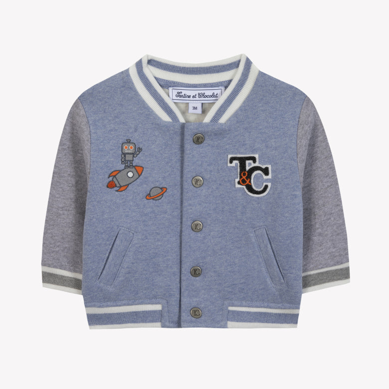 The Tartine et Chocolat Baby Boys’ and Boys’ Easy Bomber Cardigan is a light blue and gray varsity-style piece with snap buttons, front pockets, robot and rocket patches, plus "T&C" chest lettering—a fun, sporty cardigan for toddlers.