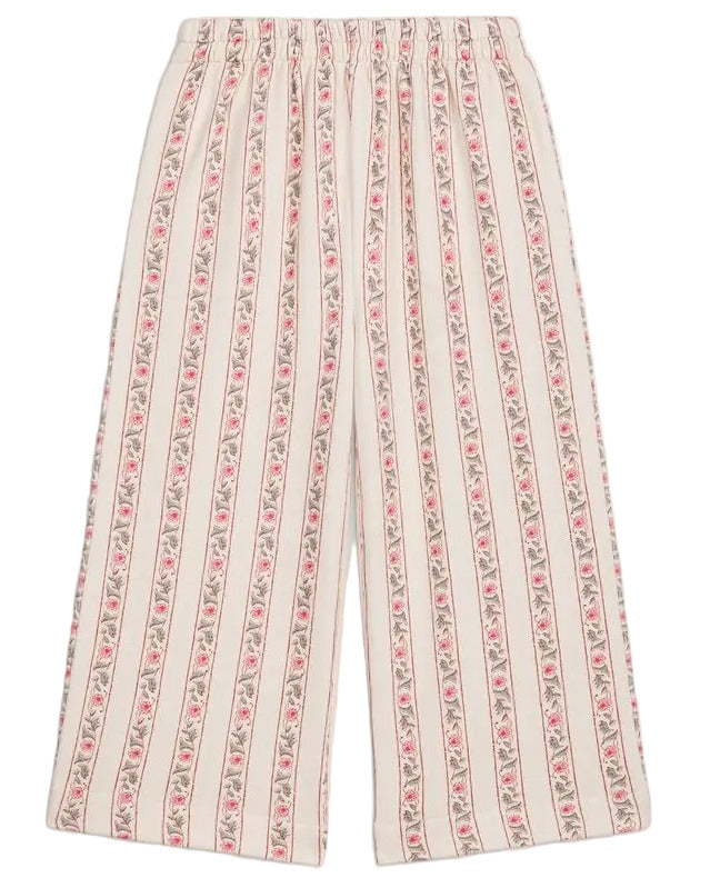 Girls’ Ysalia Sweatpant by Louise Misha features a wide-leg silhouette with a floral print of vertical pink stripes on a cream background and an elasticated waist for added comfort.