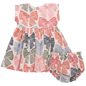 The Baby Girls' Adaline Dress Set by Pink Chicken features coordinating bloomers, both with vibrant red, pink, blue, and green multi-striped bows on white.