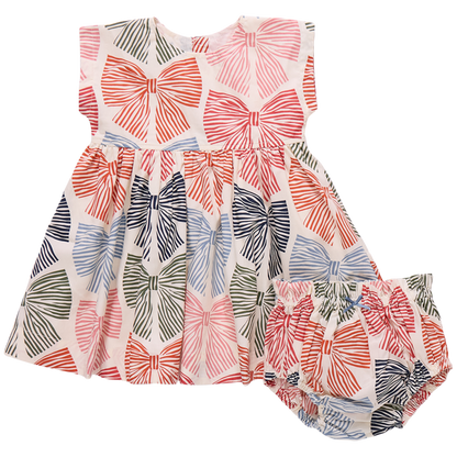 The Baby Girls' Adaline Dress Set by Pink Chicken features coordinating bloomers, both with vibrant red, pink, blue, and green multi-striped bows on white.