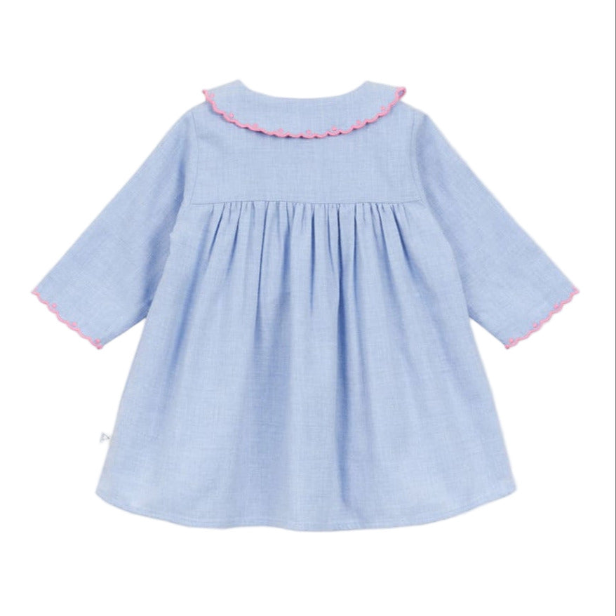 The Arsene & Les Pipelettes Baby Girls' Giovana Dress features light blue long sleeves with pink ruffled trim on the collar and cuffs, shown on a plain white background.
