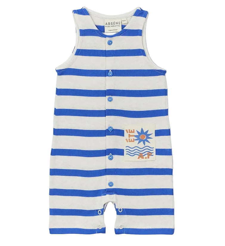 The Arsene & Les Pipelettes Baby Boys' Sailor Jumpsuit features blue and white horizontal stripes, front buttons, and a small sun and waves graphic on the left pocket—perfect for nautical-inspired baby outfits.