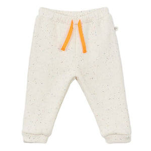 The Arsene & Les Pipelettes Baby Gabano Speckled Joggers feature white speckled fleece, an elastic waistband, and orange drawstrings, shown on a plain white background.