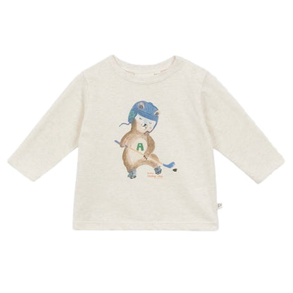 The Arsene & Les Pipelettes Baby Boys' Gregoire Hockey T-Shirt is cream-colored with long sleeves and showcases a bear in a blue helmet holding a hockey stick.