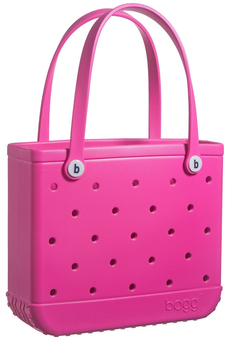 This durable pink Bogg Bags Baby Bogg Bag tote features holes for a unique look.