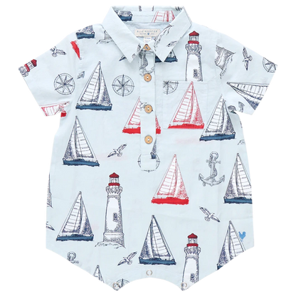 Set sail in the Pink Chicken Baby Boys' Easton Jumper—a collared short-sleeve romper decorated with playful sailboats, lighthouses, anchors, and compasses in vibrant red, blue, and white.