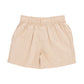 The Pink Chicken Baby Boys’ Jackson Short in beige features a high-waisted cotton canvas design with a pull-on elastic waist and belt loops, shown flat on a white background.