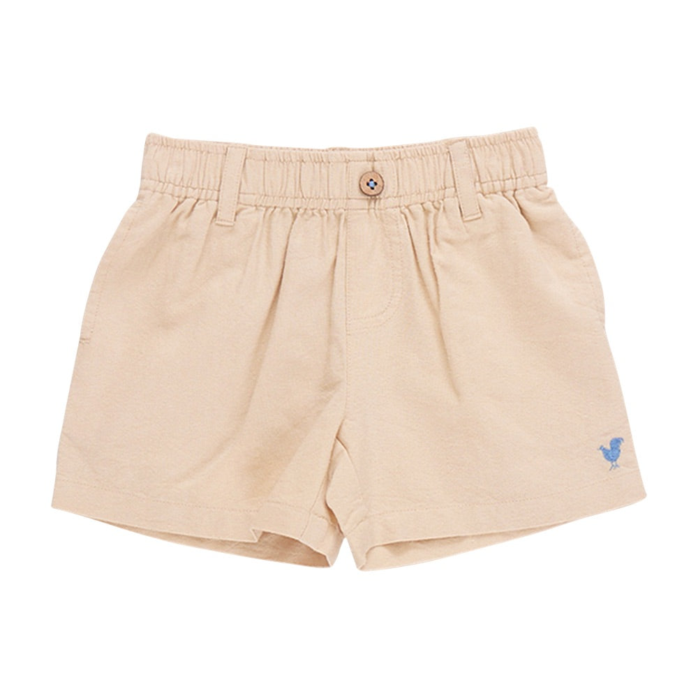 Beige cotton canvas Baby Boys’ Jackson Short by Pink Chicken for toddlers, featuring a comfortable pull-on elastic waist, button closure, belt loops, and a small blue bird embroidered near the left hem.