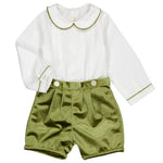 The Kidiwi Baby Boys' Barnabé Set includes an elegant long-sleeve white poplin shirt with green piping and high-waisted olive velvet shorts with decorative buttons and pleats.
