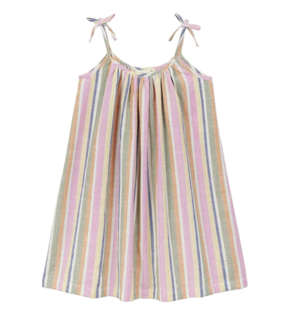 The ALP Bayadere Striped Strap Dress by Arsene & Les Pipelettes features pastel bayadere stripes and adjustable shoulder tie straps, crafted from lightweight cotton voile. It is shown laid flat against a white background.