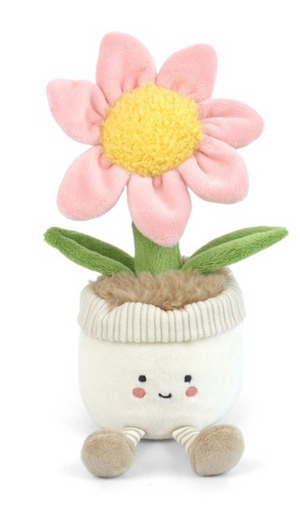 Petunia Puff by Mon Ami is a plush flower toy shaped like a flowerpot, featuring a smiling face, pink flower, green leaves, and beige legs. Sitting upright against a white background, it’s a charming addition to any garden-themed decor.