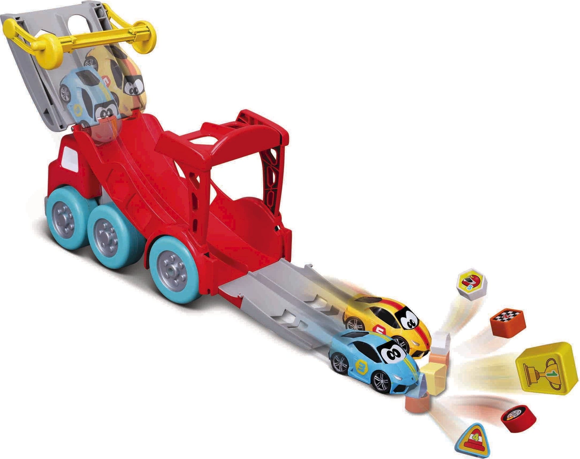 The Maisto My 1st Collection Racing Transporter toy truck features a red ramp that launches two small cartoon cars, sending them crashing into colorful blocks decorated with fun images of road signs and objects—perfect for young fans of speedy vehicles like the Lamborghini Huracán.