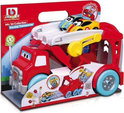 The Maisto My 1st Collection Racing Transporter features a red toy truck with two small race cars, including a sleek Lamborghini Huracán, displayed on a white ramp and packaged in a box suitable for ages 12 months and up.