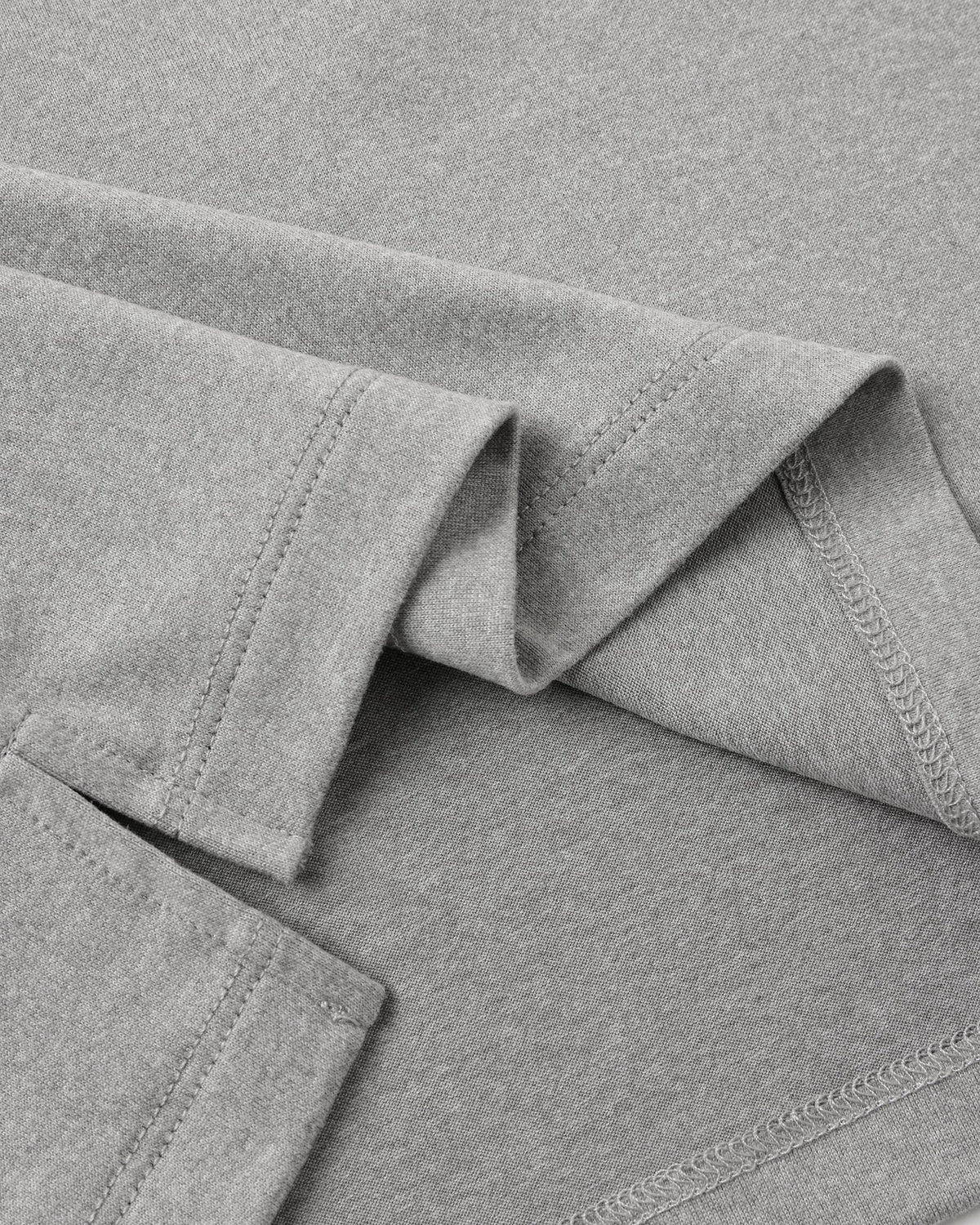 Close-up of a folded light gray Boys’ Cove Essential Tee by Rylee & Cru, highlighting fine stitching and smooth texture—an everyday essential made for comfort.