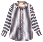 The Gillian Shirt by Xirena is a relaxed, long-sleeve cotton shirt featuring vertical black, white, and brown stripes with a classic collar and cuffs.