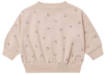 Quincy Mae’s Baby Girls’ and Girls’ Relaxed Sweatshirt in light beige features small, scattered heart outlines and ribbed cuffs, hem, and crew neckline—a cozy essential for any little one’s wardrobe.