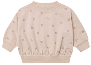 Quincy Mae’s Baby Girls’ and Girls’ Relaxed Sweatshirt in light beige features small, scattered heart outlines and ribbed cuffs, hem, and crew neckline—a cozy essential for any little one’s wardrobe.