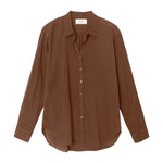 The Xirena Beau Shirt is a brown, long-sleeve button-up with a collar, made from lightweight cotton poplin and shown flat on a white background.