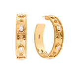 The Berry Hoop Earrings by Juliska Capucine De Wulf feature hammered gold hoops with raised details and clear gemstones, displayed from front and side angles on a white background.