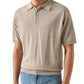 A person wearing the Eton Beige Cotton Linen Polo with blue jeans, shown from the waist up against a plain background.
