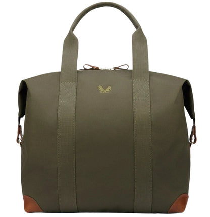 The Bennett Winch Medium Cargo, by Bennett Winch, is a tote bag in green, made from waterproof nylon. It boasts two handles with leather accents at the corners and a subtle logo on the front. Additionally, it includes a removable pouch for added versatility.