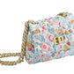 Milledeux Small Chain Bag in Liberty Print with chain strap and metal closure.