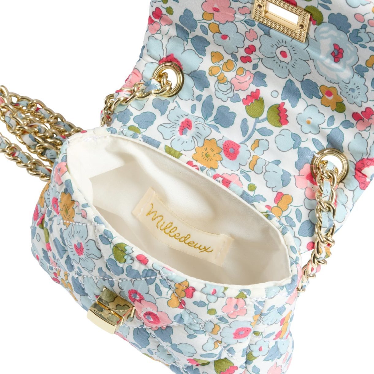 Milledeux Small Chain Bag in Liberty Print, displaying the Milledeux label inside.