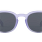 A pair of IZIPIZI Kids’ #C Polarized Sunglasses featuring an ergonomic design, round dark lenses, and a translucent light purple frame, displayed against a white background.