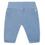 Tartine et Chocolat Baby Boys’ Corduroy Trousers in light blue, featuring an elastic waistband, button accents on either side of the waist, and elasticized cuffs at the ankles, displayed against a white background.