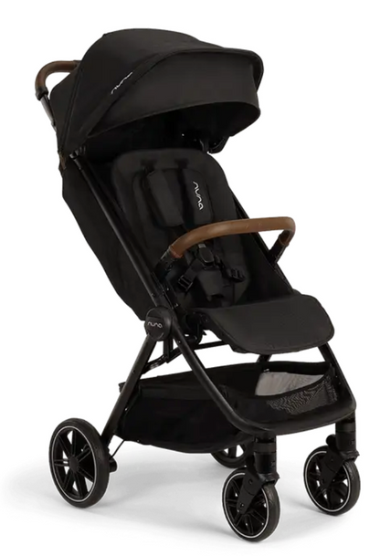 The Nuna TRVL lx Stroller in black features a sun canopy, brown handlebar, four wheels, padded harness seat, and an underseat storage basket—delivering compact luxury for your adventures.