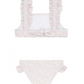 The Minnow Girls' Ruffle Strap Bikini in Antique Floral by Minnow features a chic square-neck top with ruffled wide straps and an adjustable back tie for a perfect fit, along with the bottoms having elegant ruffled detailing on the sides. The fabric boasts a subtle pink floral design that enhances its vintage charm.