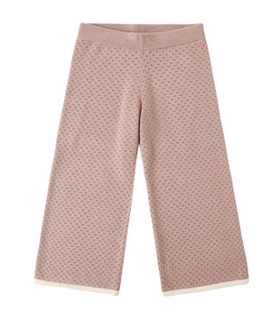 Rylee & Cru Girls’ Pointelle Knit Pant in pink features a wide-leg silhouette with a textured pointelle pattern, ribbed waistband, and white scalloped hem, shown laid flat on a white background.