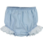 The Louis Louise Baby Girls' Douceur Bloomer is crafted from soft cotton chambray in light blue, featuring an elasticated waist and leg openings. The legs are elegantly adorned with delicate white lace ruffles for a charming touch.