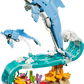 Two LEGO® sea animal figures—a large and a small dolphin—leap over a wave above a coral reef, all built with the Legos - Toyhouse LEGO® Creator 3-in-1 Sea Animals: Beautiful Dolphins set.