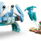 The LEGO® Creator 3-in-1 Sea Animals: Beautiful Dolphins set from Legos - Toyhouse features a colorful crab and clear blue fish next to an underwater scene with seaweed, flowers, starfish, seashells, and sea animal figures.