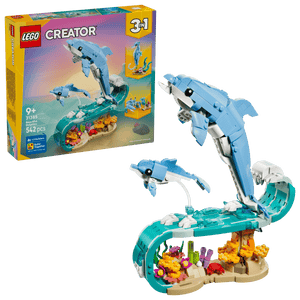 Explore the LEGO® Creator 3-in-1 Sea Animals: Beautiful Dolphins set by Legos - Toyhouse, featuring two dolphin figures above a colorful coral reef, with the vibrant product box shown in the background.