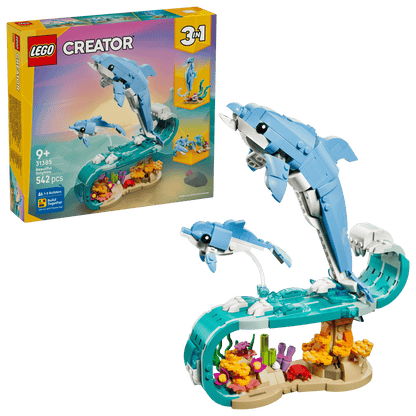 Explore the LEGO® Creator 3-in-1 Sea Animals: Beautiful Dolphins set by Legos - Toyhouse, featuring two dolphin figures above a colorful coral reef, with the vibrant product box shown in the background.