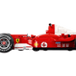 The LEGO® Icons Ferrari F2004 & Michael Schumacher from Legos - Toyhouse is a red Formula 1 model car, displayed side-on against a white background, featuring sponsor logos including Vodafone, Shell, and Bridgestone.